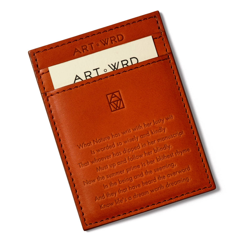 Art card holder reverse displays a quote by William Ernest Henley embossed on brown Italian vegetable tanned leather. Inside is a cream ART WRD exploration card.