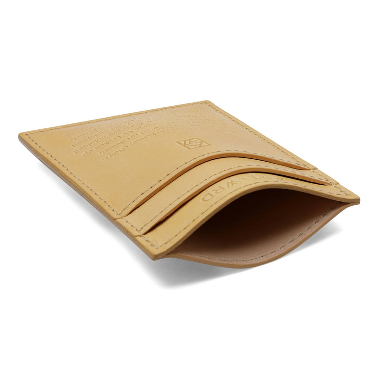 Middle pocket view of a minimalist leather card holder.