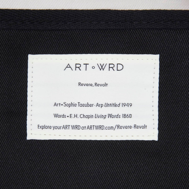 Abstract art tote bag information label close up. 