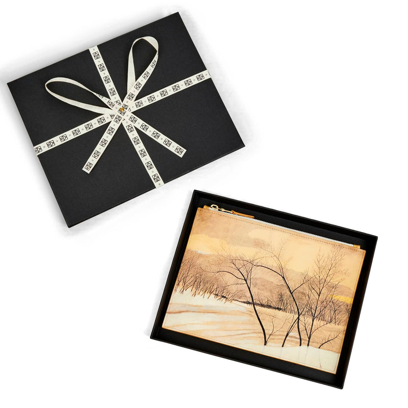 Art bag printed with tree painting by Léon Spilliaert in black box packaging with ART WRD logo cotton ribbon.