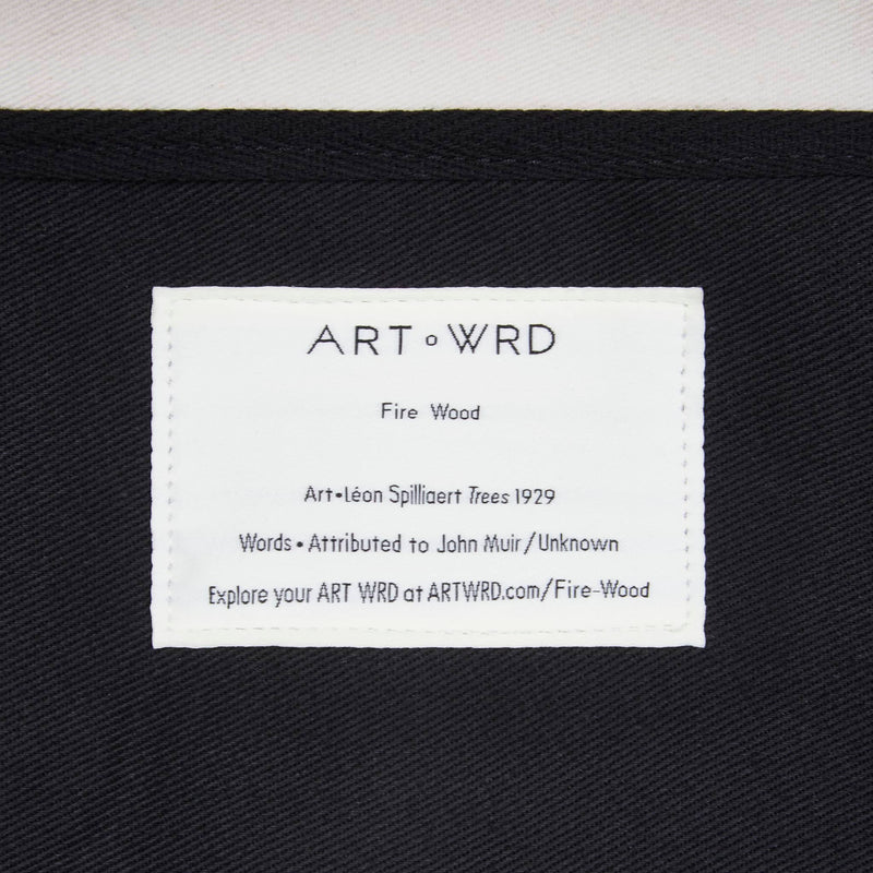 Information label about the artist and writer who helped create this artsy tote bag.