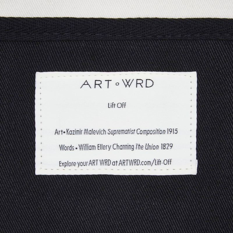 Information label about the artist and writer who helped create this cool unique tote bag.