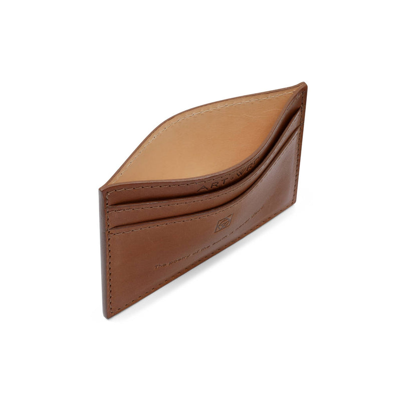 View of the leather lined creative card holder central pocket. 