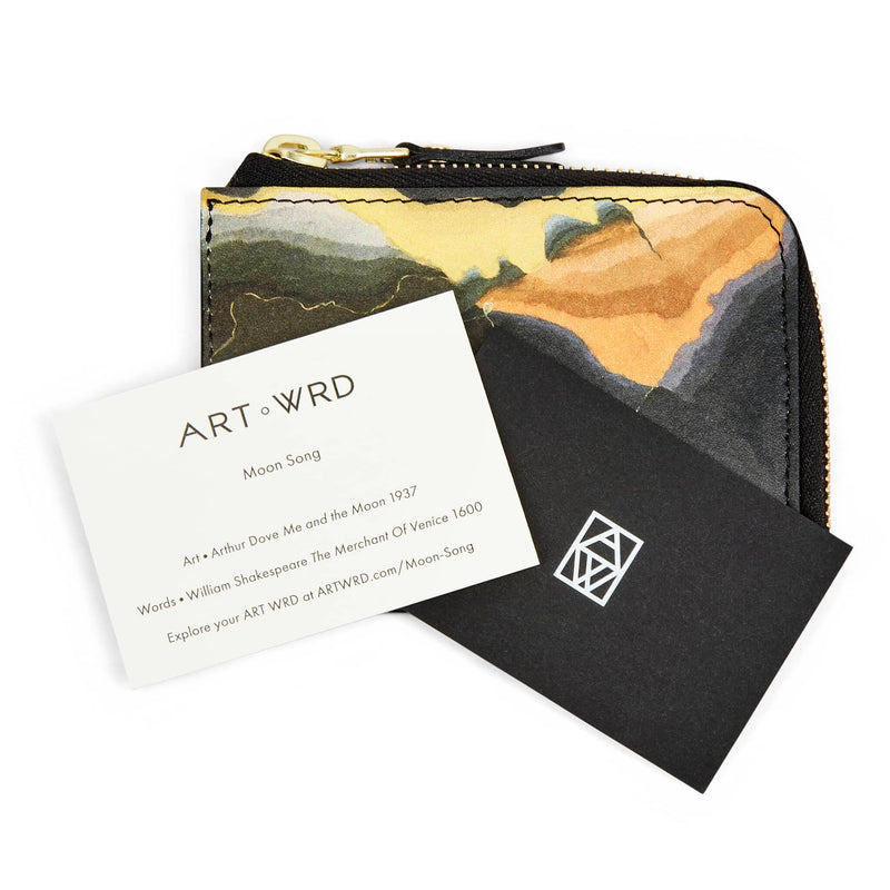 ART WRD artist and writer information cards on top of creative wallet with Arthur Dove 'Me And The Moon' artwork.