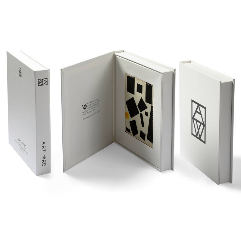 Minimalist leather card holder with abstract minimalist artwork by Kazimir Malevich in book box packaging.