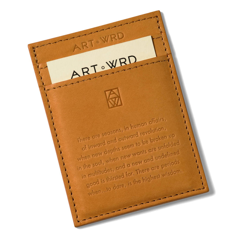Minimalist leather card holder reverse with inspiring embossed quote. An ART WRD artist and writer information card is in the bottom credit card pocket.