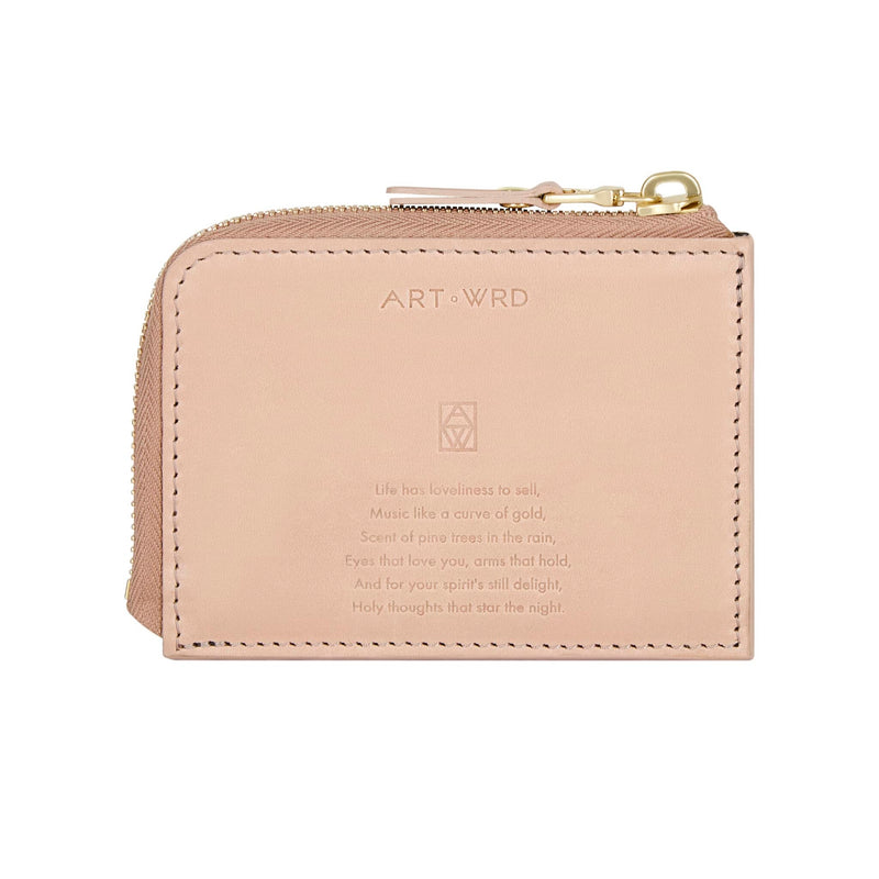Unusual purse with a Sara Teasdale quote embossed on mushroom-grey vegetable tanned leather.